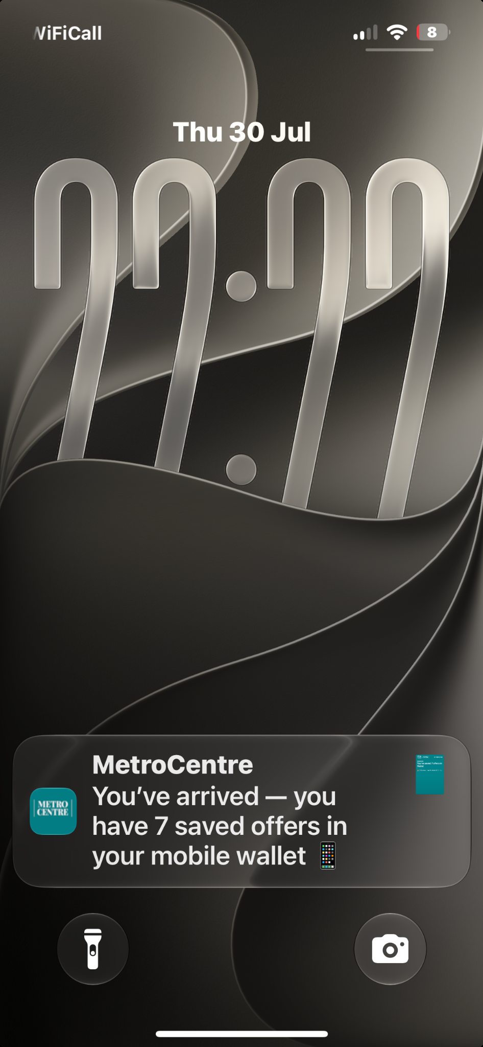 Complete iPhone lock screen showing the Metrocentre push notification