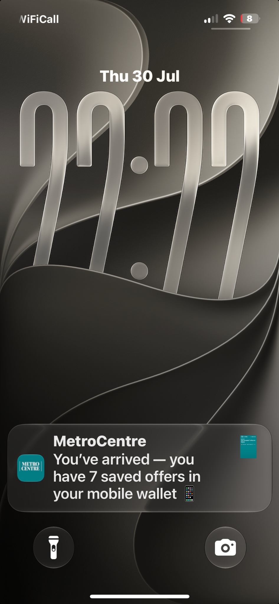 Complete iPhone lock screen showing the Metrocentre push notification