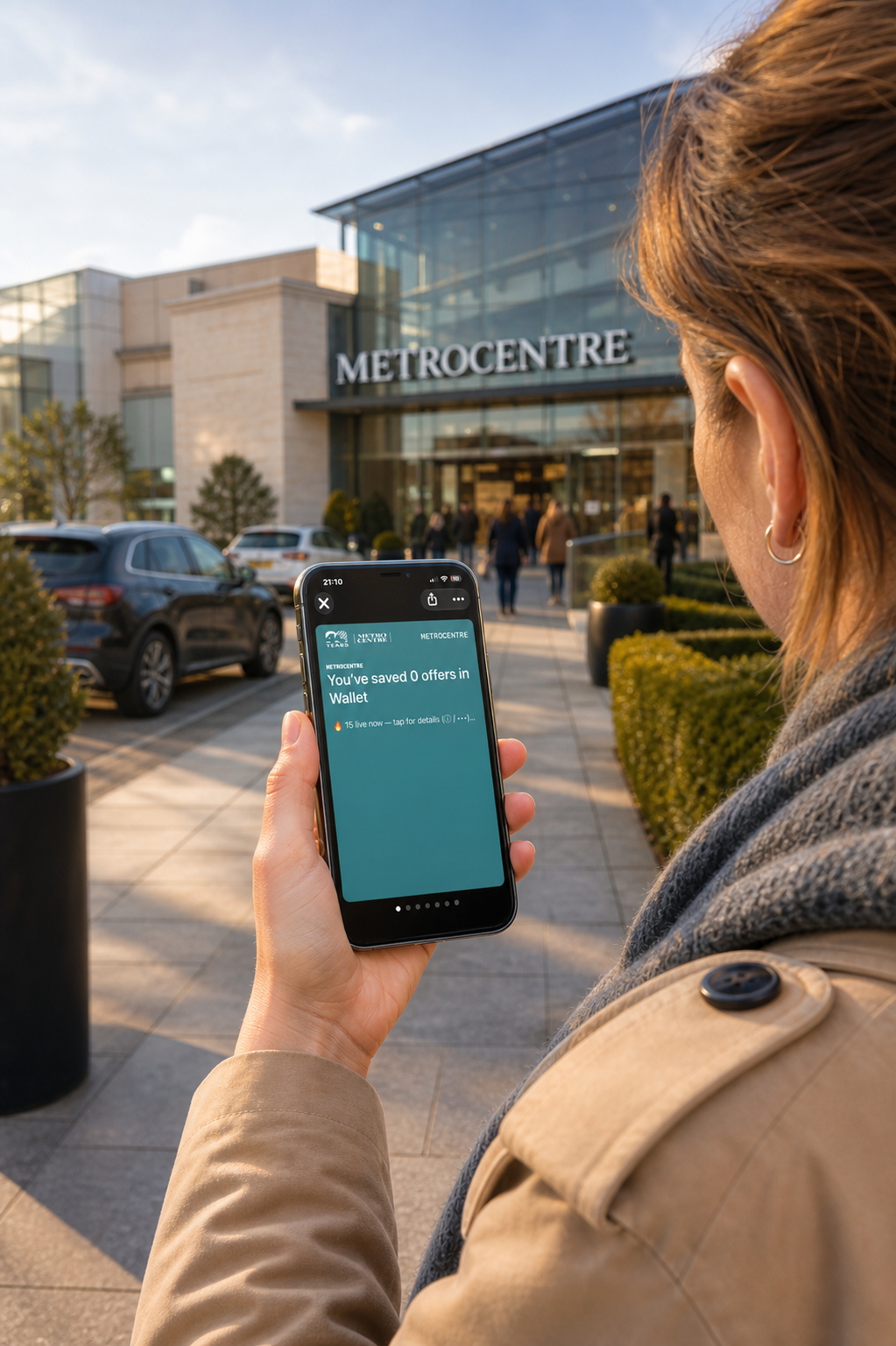 Shopper viewing the Metrocentre Wallet pass while approaching the shopping centre